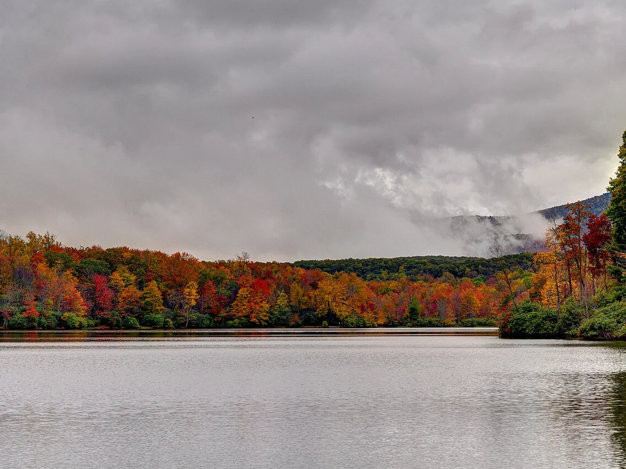 Fall color reflected in Price Lake on the Blue Ridge Parkway