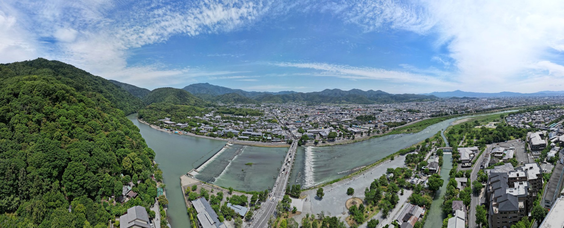 Green hills and the Katsura River around Togetsukyo Bridge in Arashiyama, Kyoto, Japan