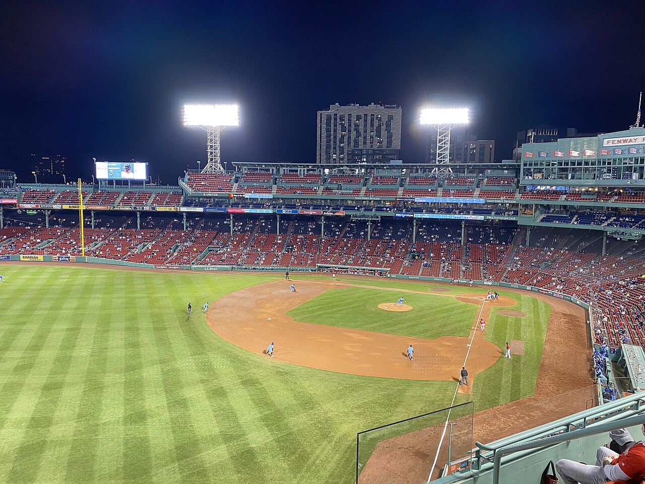 Baseball game under the lights at Fenway Park