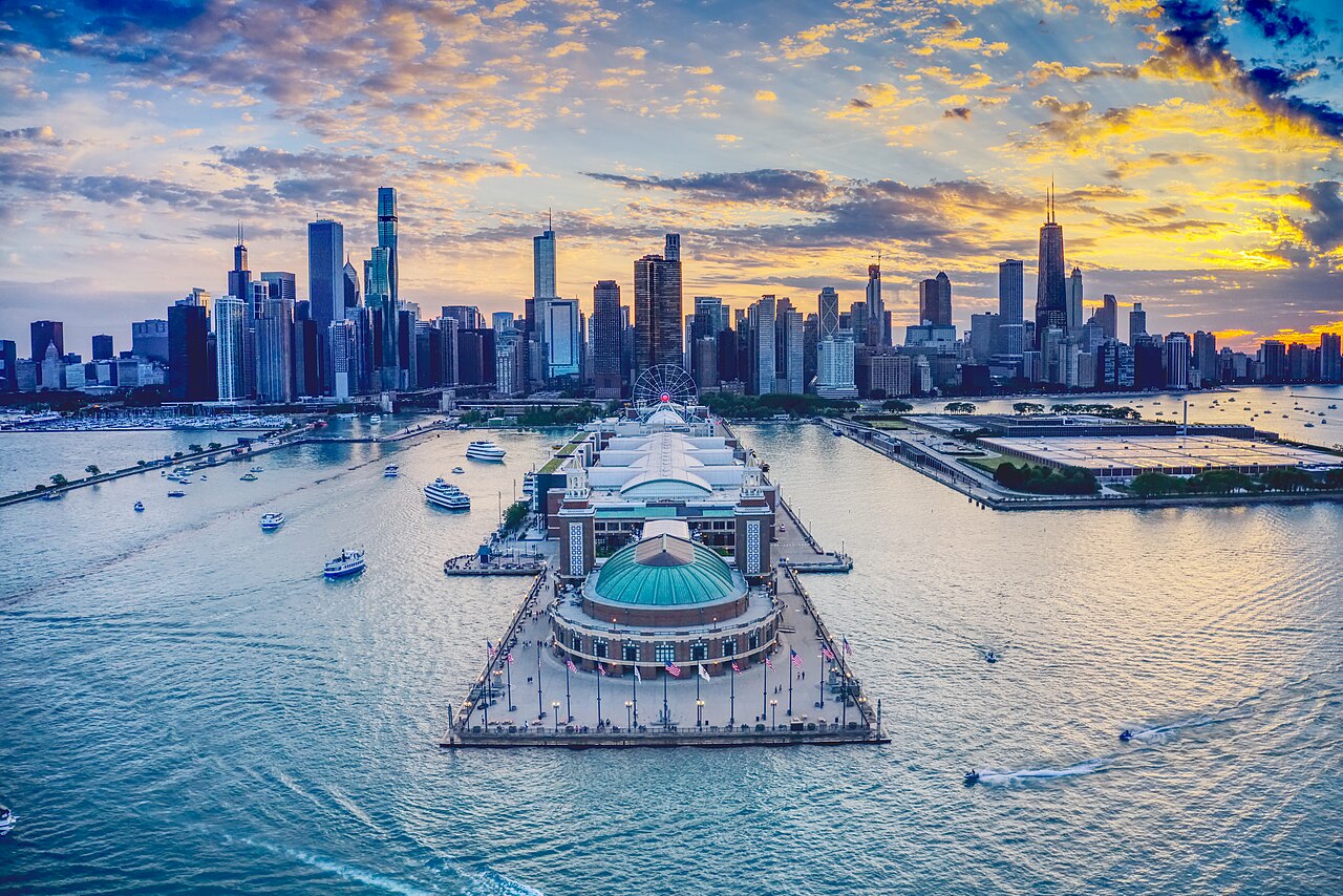 Aerial view of Navy Pier and the Chicago skyline at sunset